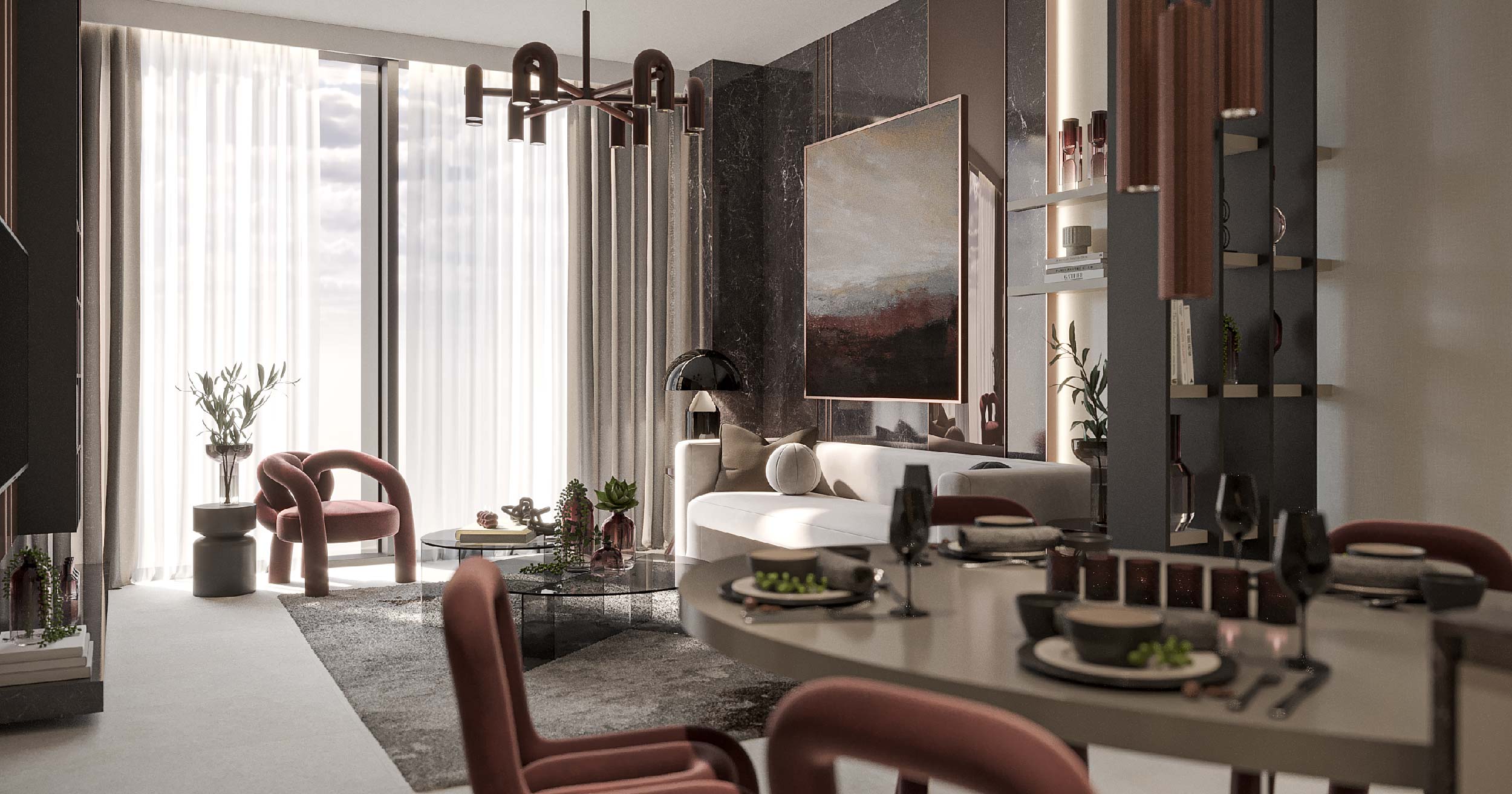 Luxor By Imtiaz A modern, stylish living and dining area featuring red chairs, a round table, and elegant decor with large windows.
